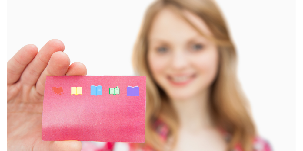 girl holding loyalty card