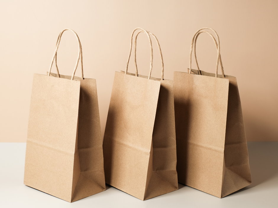 3 brown gifts bags in a row